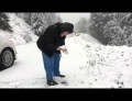 101-year-old woman has a great time throwing a snowball and has a cannon for an arm.