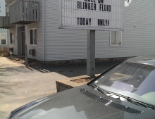 Auto repair shop is having a one day sale on blinker fluid.