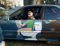 Car art featuring toilet humor.