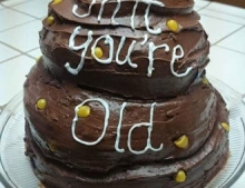 Getting old sucks and receiving a birthday cake that looks like a corny turd doesn't help.
