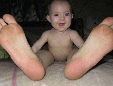 If this baby grows into his feet, he should be about 9 feet tall.