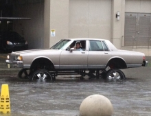It All Makes Perfect Sense Now. Huge Rims Help You Get Through Floods.
