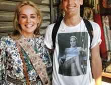 Sharon Stone spots a man in Tel Aviv wearing a Basic Instinct shirt and asks to take a picture with him.