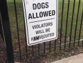 This No Dogs Allowed sign has been modified to more accurately describe what will happen to the offenders.