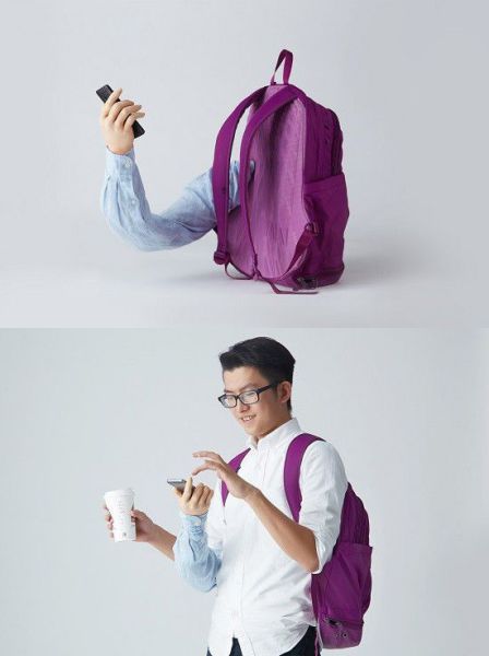 Backpack with a built in extra arm for those smartphone addicts.