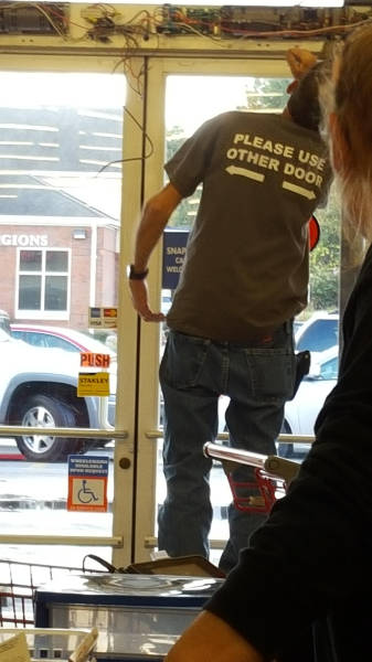 Door repair guy wears this shirt to work to save himself from being interrupted all day.