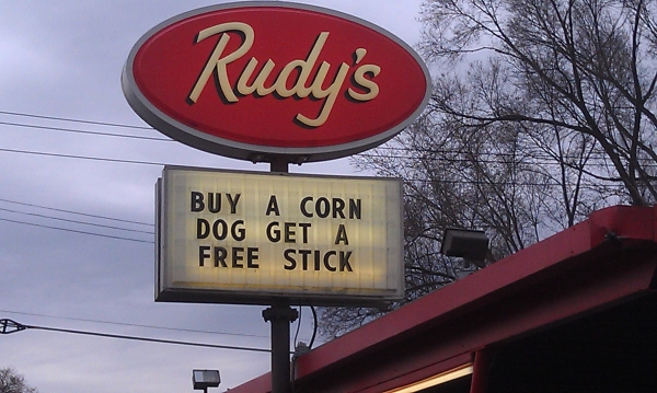 Buy a corn dog get a free stick sign should really help increase sales.