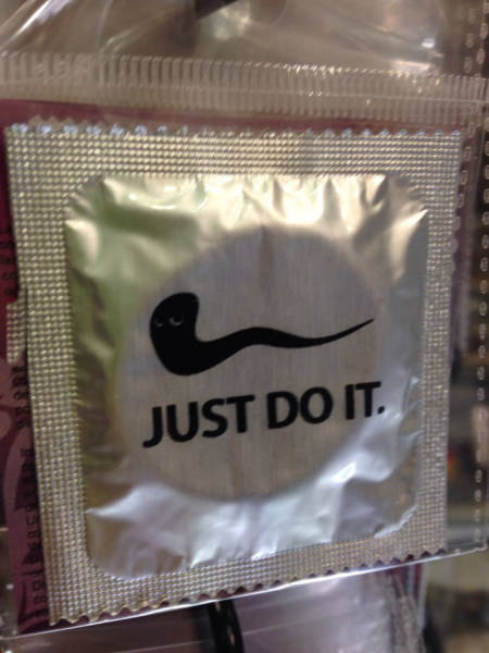 Condom with the familiar slogan of 'Just Do it' and splooge logo is a nice touch.