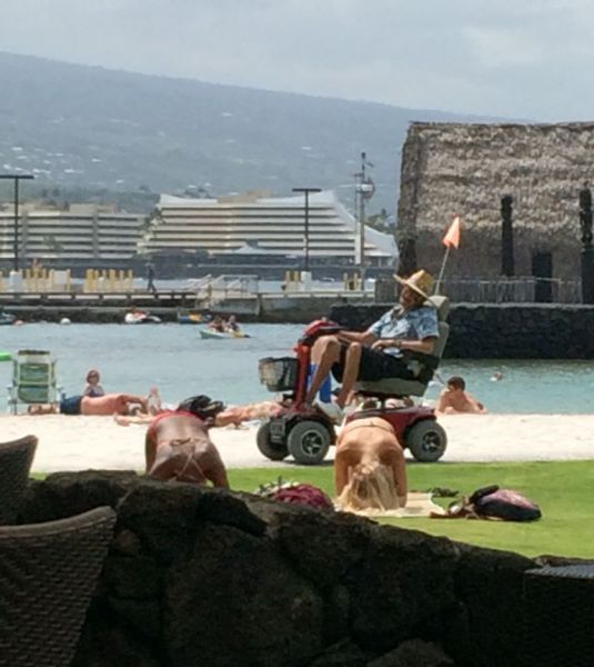 Cruisin' the beach checking out the hotties.