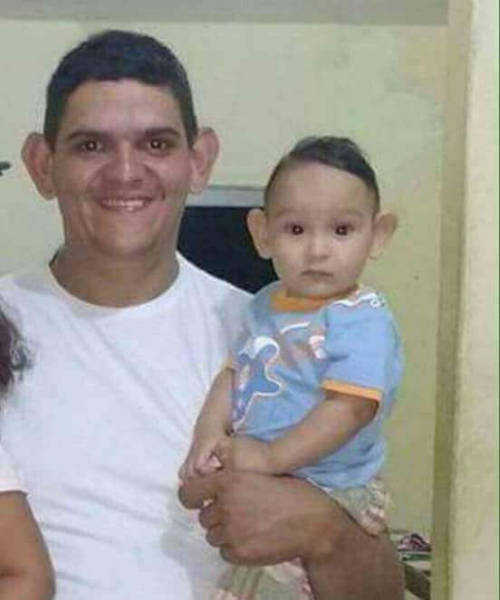 Dad and son have very similar features.