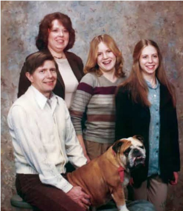 Everything was fine until they decided to include the dog in the family portrait