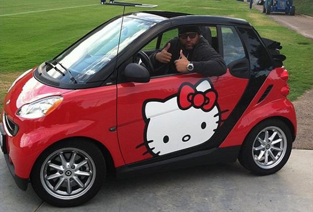 Former NFL Football Player Antonio Garay shows his sweeter side while driving around in his Hello Kitty inspired Smart Car.