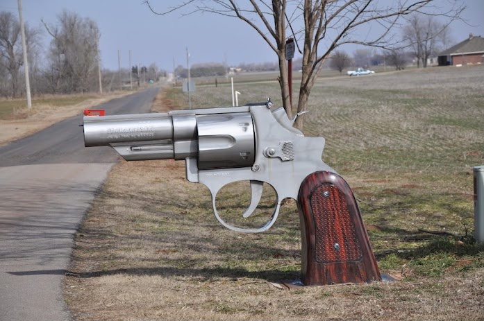 Giant gun mailbox is sure to deter thieves.