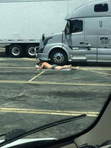 Truck driver catching some rays.