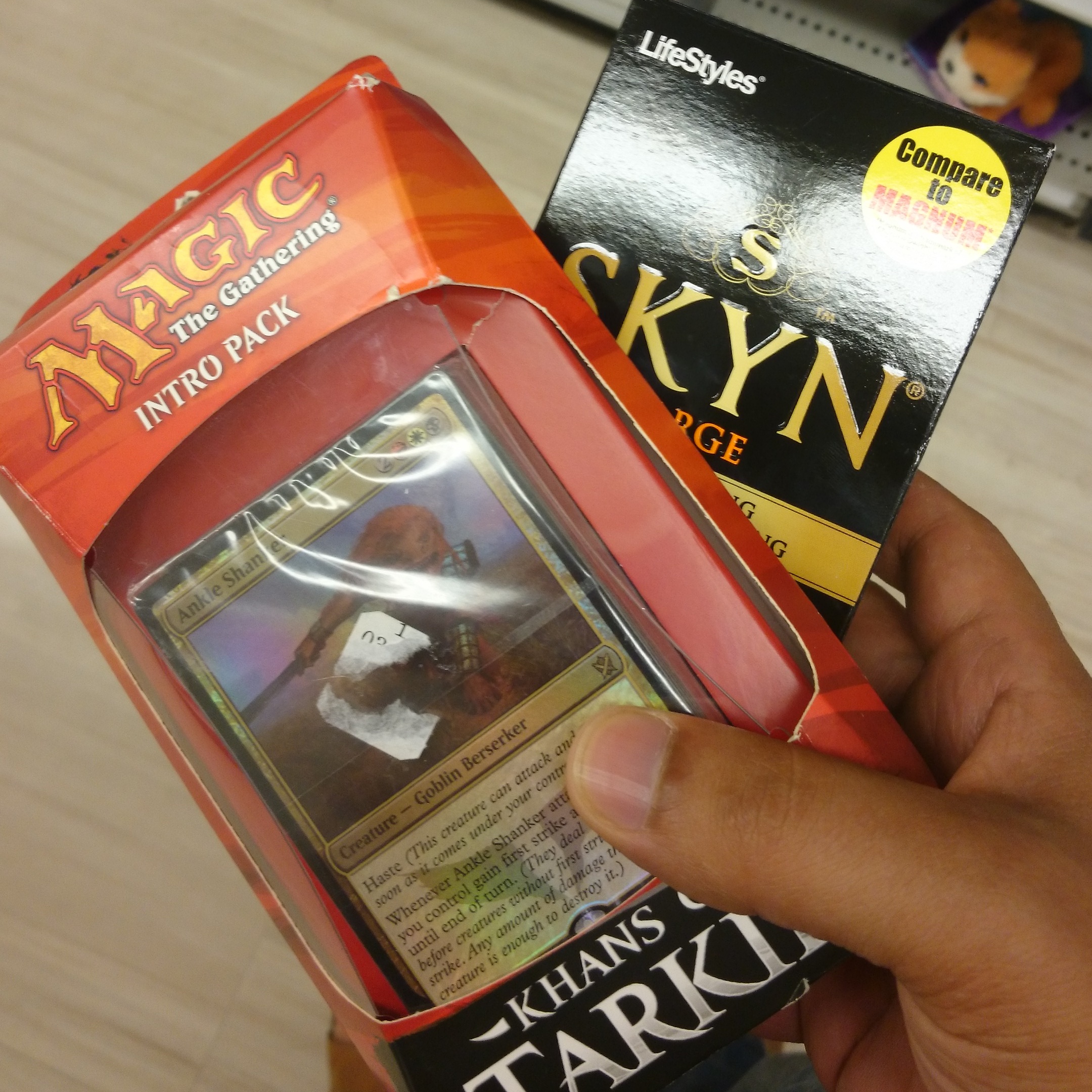 How to totally confuse the cashier. Magic: The Gathering intro pack and condoms.