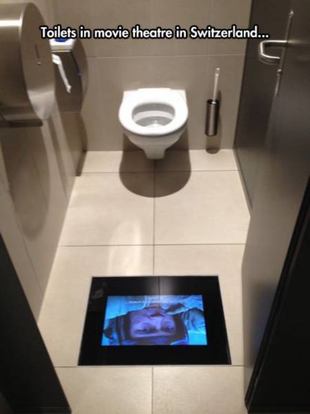 If you have to use the bathroom at this theater in Switzerland you won't have to worry about missing parts of the movie.