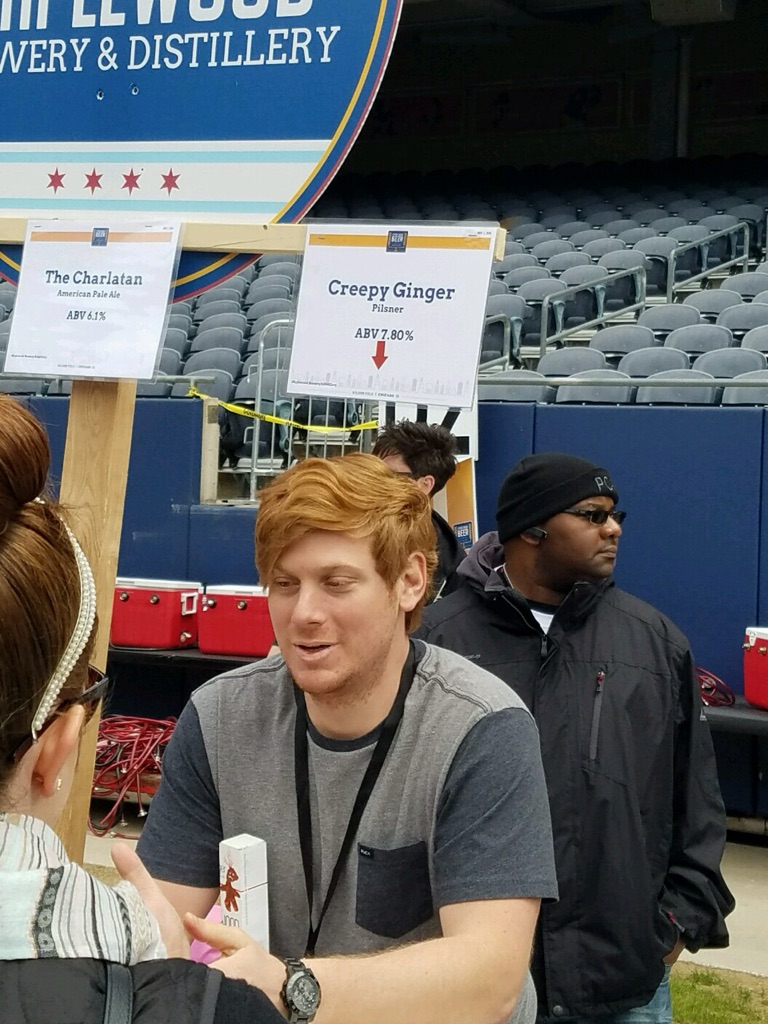 Not sure if the sign is for the beer or the guy.