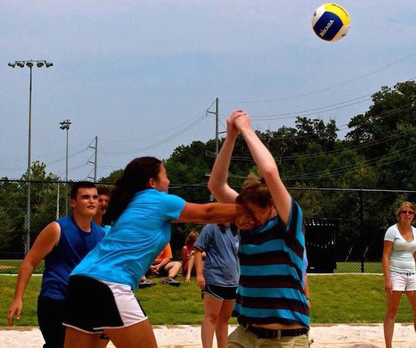 Out in the sunshine enjoying a friendly game of volleyball and then this happens.