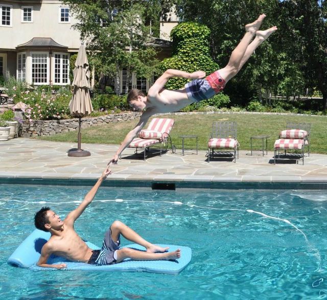 Perfectly Timed Picture And Stunning Recreation Of The Creation Of Adam Painting By Michelangelo.