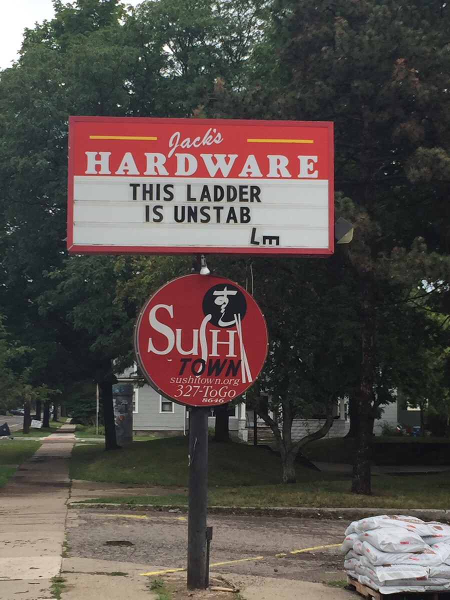 Sign outside local hardware store shows they have a sense of humor....or crappy ladders.