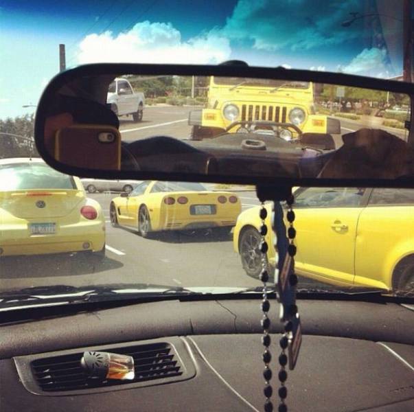 Surrounded by yellow at a stop light.