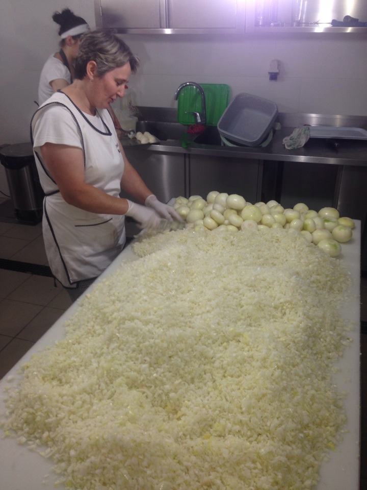This Picture Of A Woman Cutting A Huge Pile Of Onions By Hand Will Make You Cry Just Looking At It. 