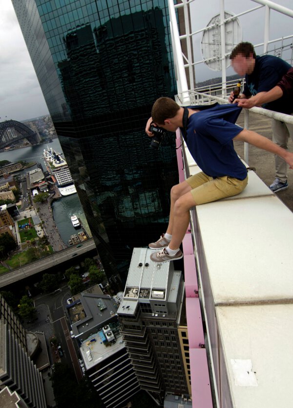When Your Friend Is Holding Your Shirt So You Don't Fall Off A Tall Building You Should Make Him Put Down His Beer First.
