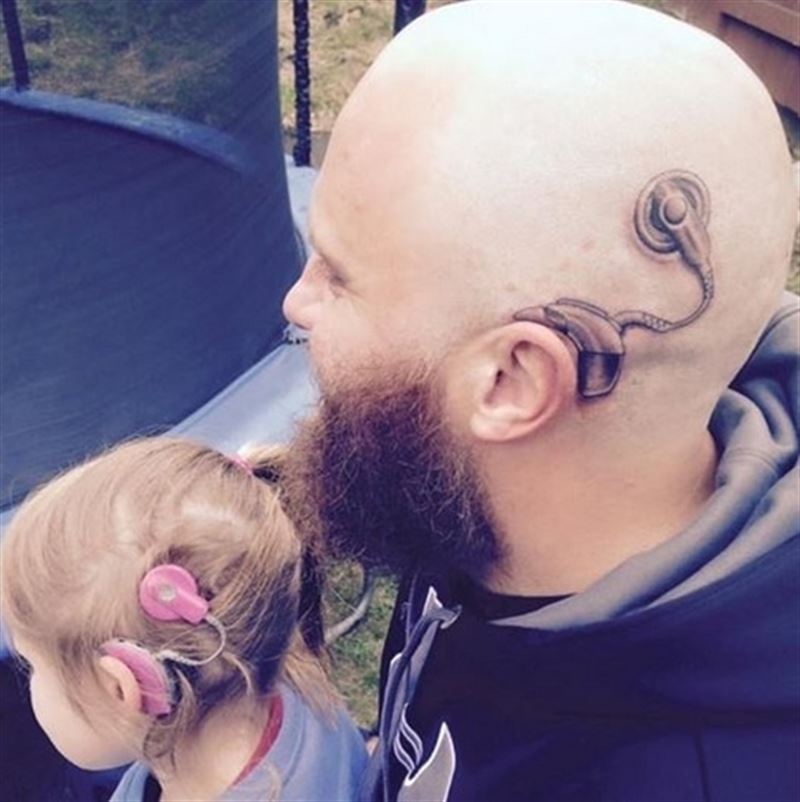 Awesome Dad from New Zealand got a cochlear implant tattoo 'out of love' for his daughter.