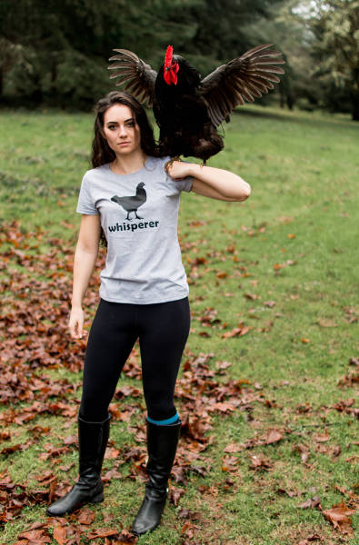 Cock whisperer showing off her skills.