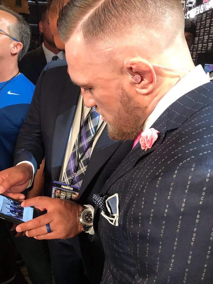 Conor McGregor looking sharp in his custom suit at the Mayweather/McGregor  press conference.