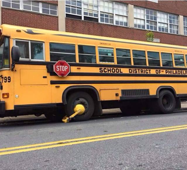 Even a school bus is not exempt from getting a parking boot.