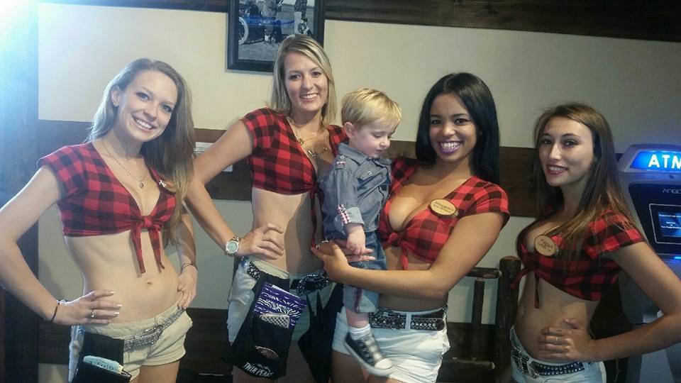 Everyone in this picture smiled at the camera except the little boy who was too distracted.