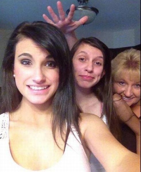 Great Picture Of These Three Women But What Is That!? Oh It's Just Her Arm.