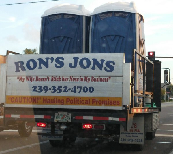 Great Sign On The Back Of This Porta Potty Truck. 