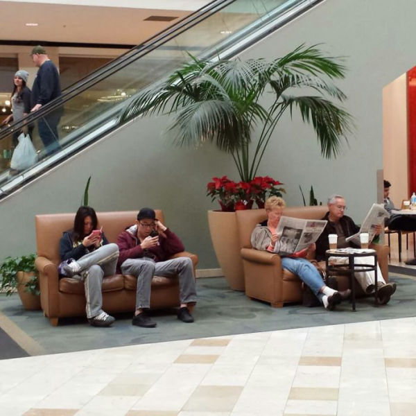 Here we see two loving couples from different generations relaxing and enjoying each others company. 