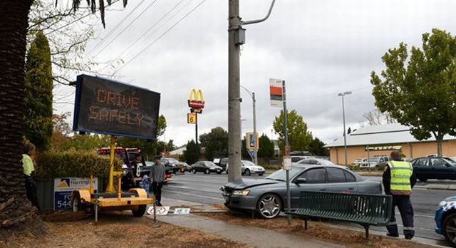 I wonder if the flashing drive safely sign caused this accident.