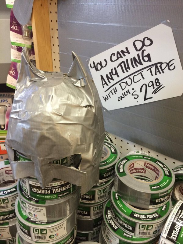 Batman mask duct tape display is sure to increase sales.