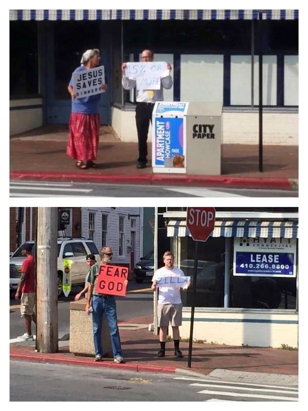 Having fun with religious sign holders.