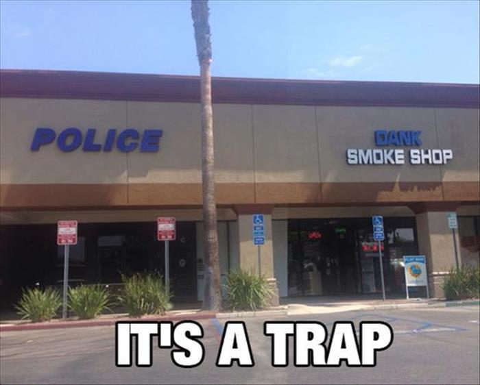 Police station next to a smoke shop seems very suspicious.