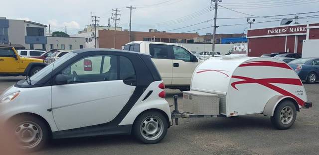 Smartcar pulling a teardrop trailer is a great camping set up for the less is more crowd.