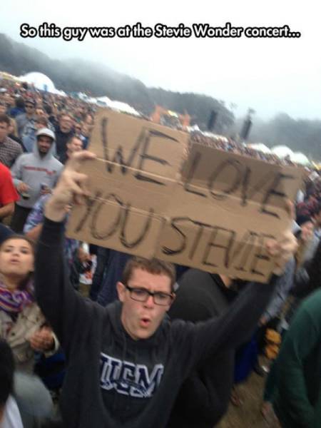 So this guy brought a sign with him to a Stevie Wonder concert.