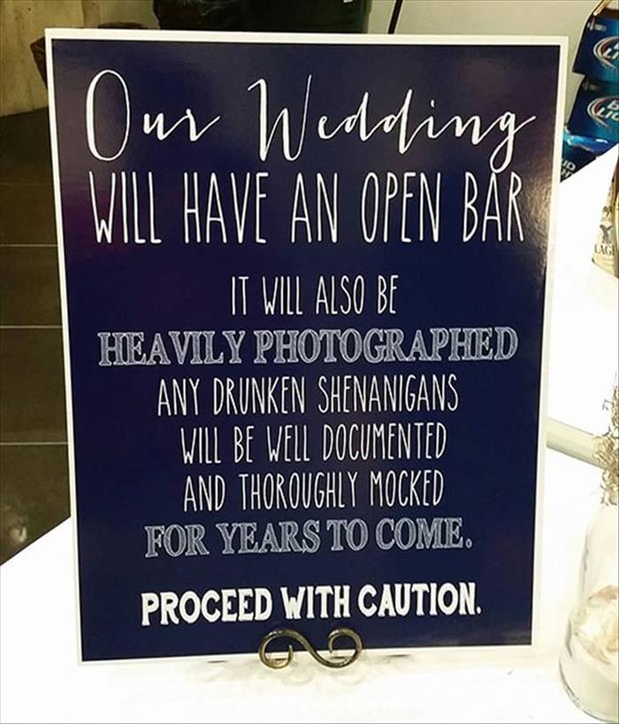 The open bar at this wedding comes with a warning.