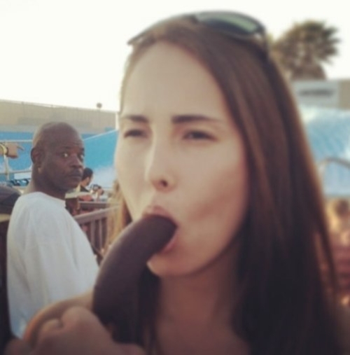 This Guy Is Jealous Of Her Chocolate Covered Banana.