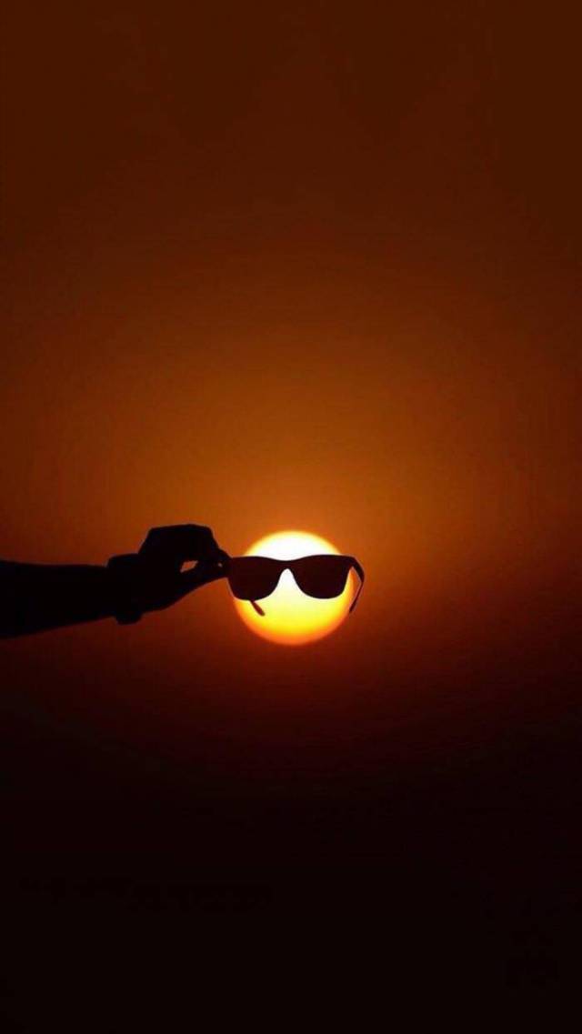 The sun is so bright its gotta wear shades.