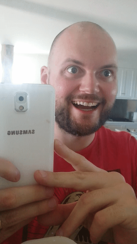 What is this guy waiting for!? Just take the damn picture already!