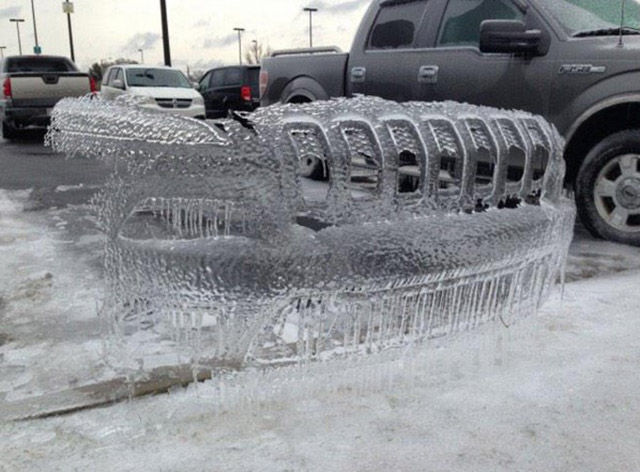 You know it is cold when a parked car leaves a perfect impression of its front end in ice.