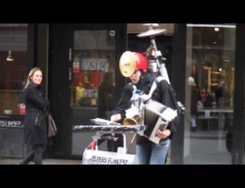 One man band playing the Star Wars theme song