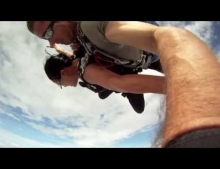 Tandem skydivers nearly get taken out by the plane they just jumped out of. Epic job by the skydiving instructor but what in the world was the pilot doing?