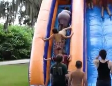 Portly woman takes out all the kids on the water slide stairs.