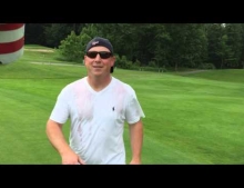 Hole in one tribute video including a beer bath and smiles all around.